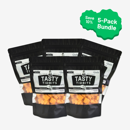 Five bags of Dapper Dog Cheddar Cheese Tasty Tidbits, freeze-dried cheese cubes, in a 5-pack bundle that saves 10%