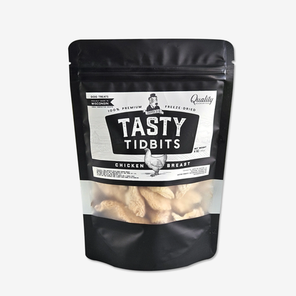 Dapper Dog Chicken Breast Tasty Tidbits 4 oz bag with freeze-dried chicken visible through the window